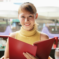 2woman holding menu