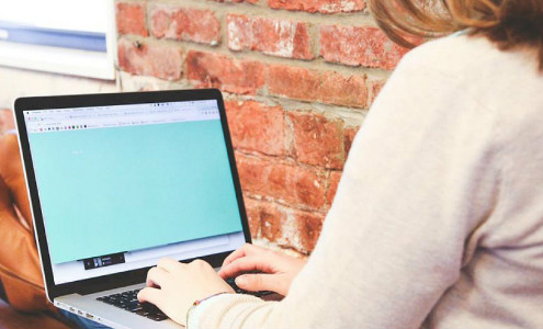 Woman with computer banner