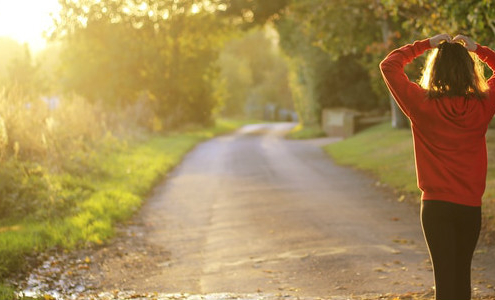 Woman Walking on Path