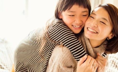 asian woman with young daughter banner